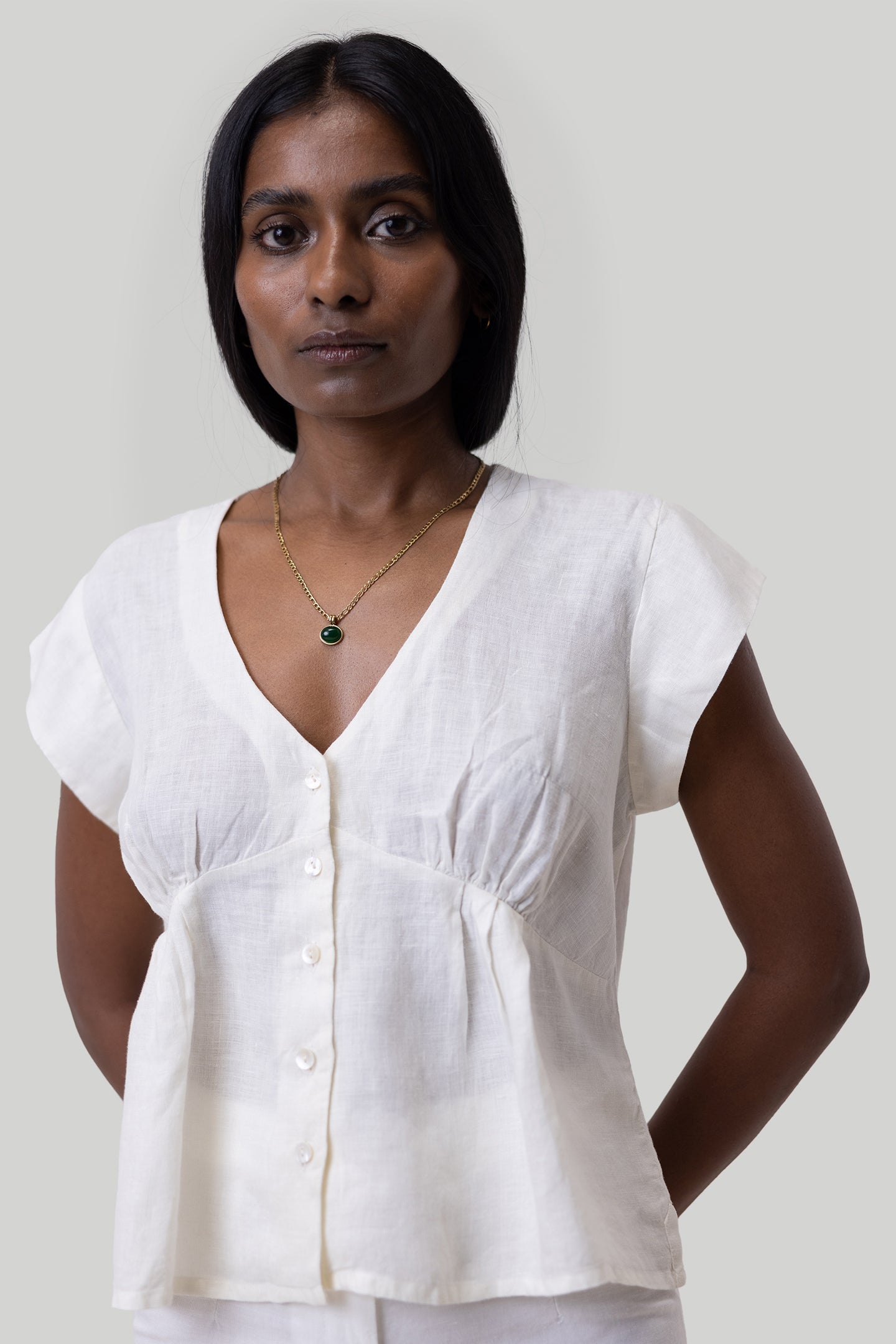 Deep V-neck short off-white top 02