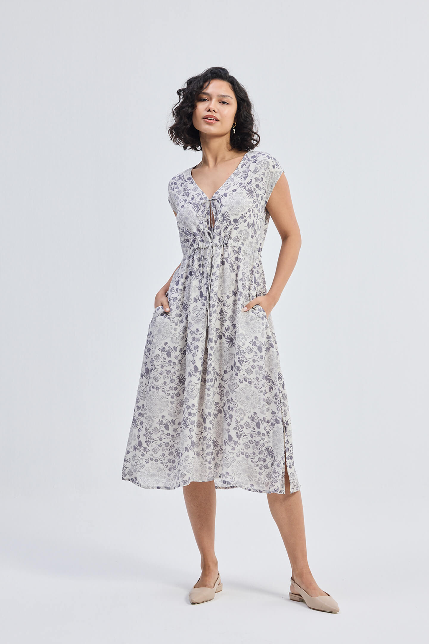 Deep V-neck Gathered Dress in Florals Front