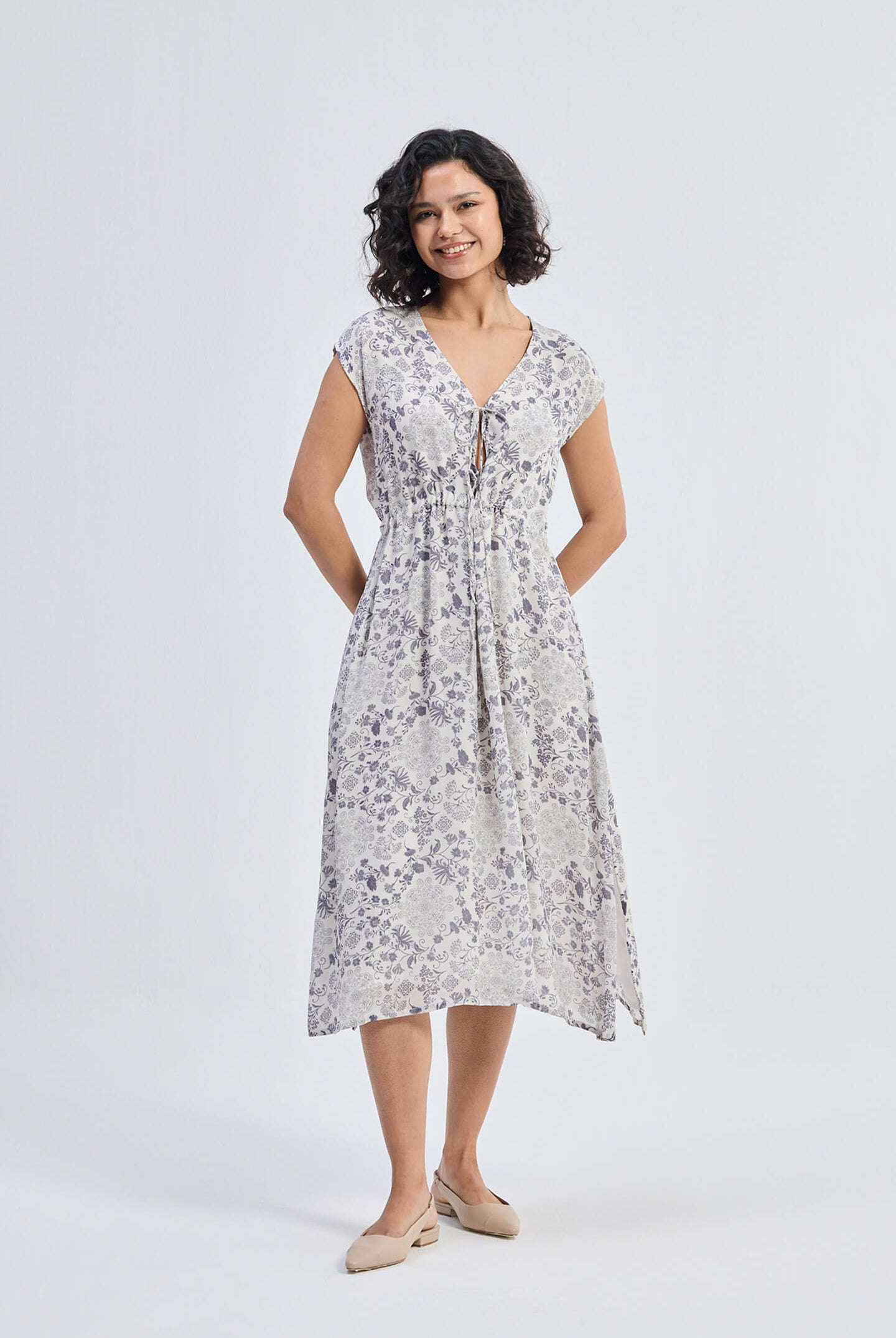 Deep V-neck Gathered Dress in Florals Front