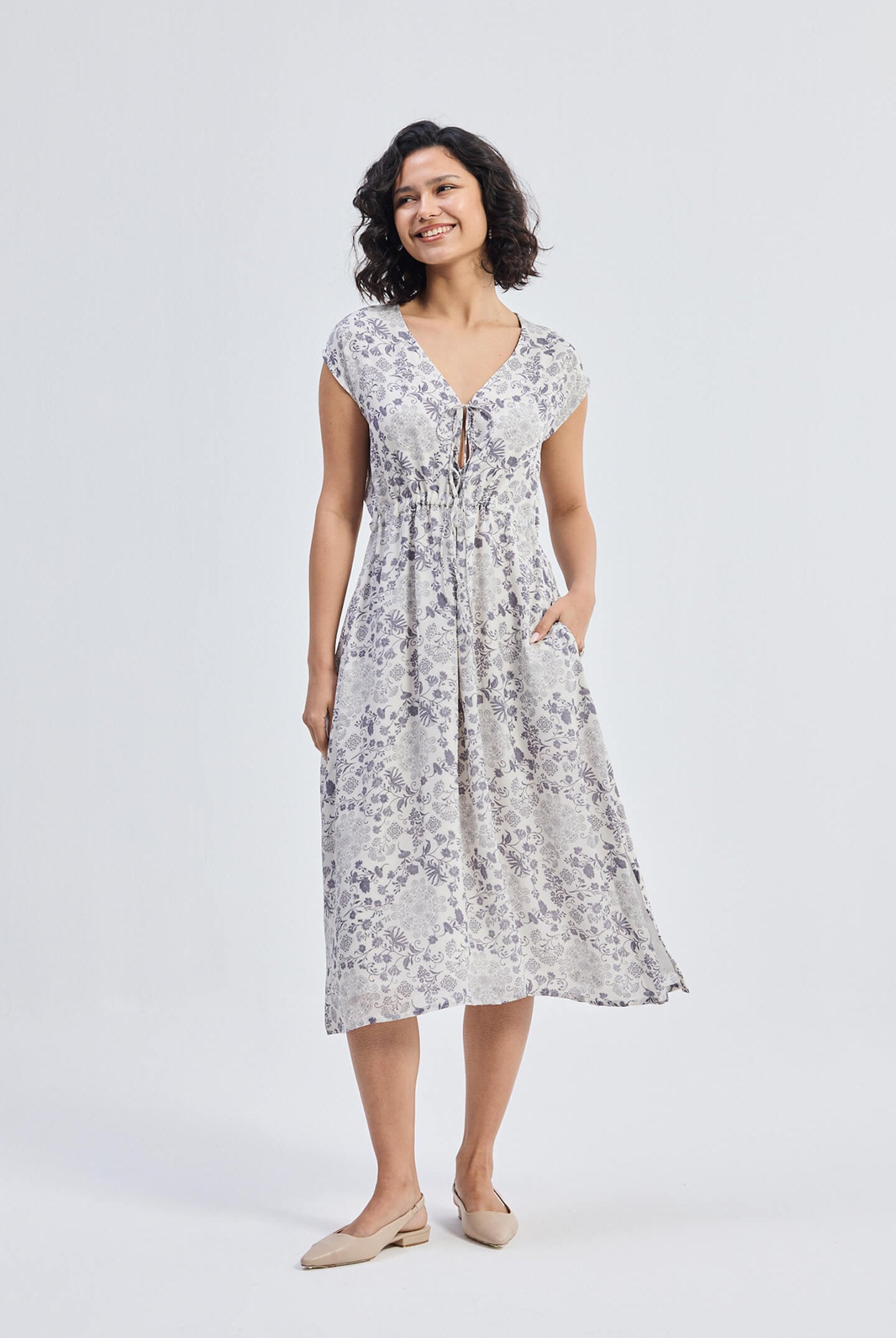 Deep V-neck Gathered Dress in Florals Front