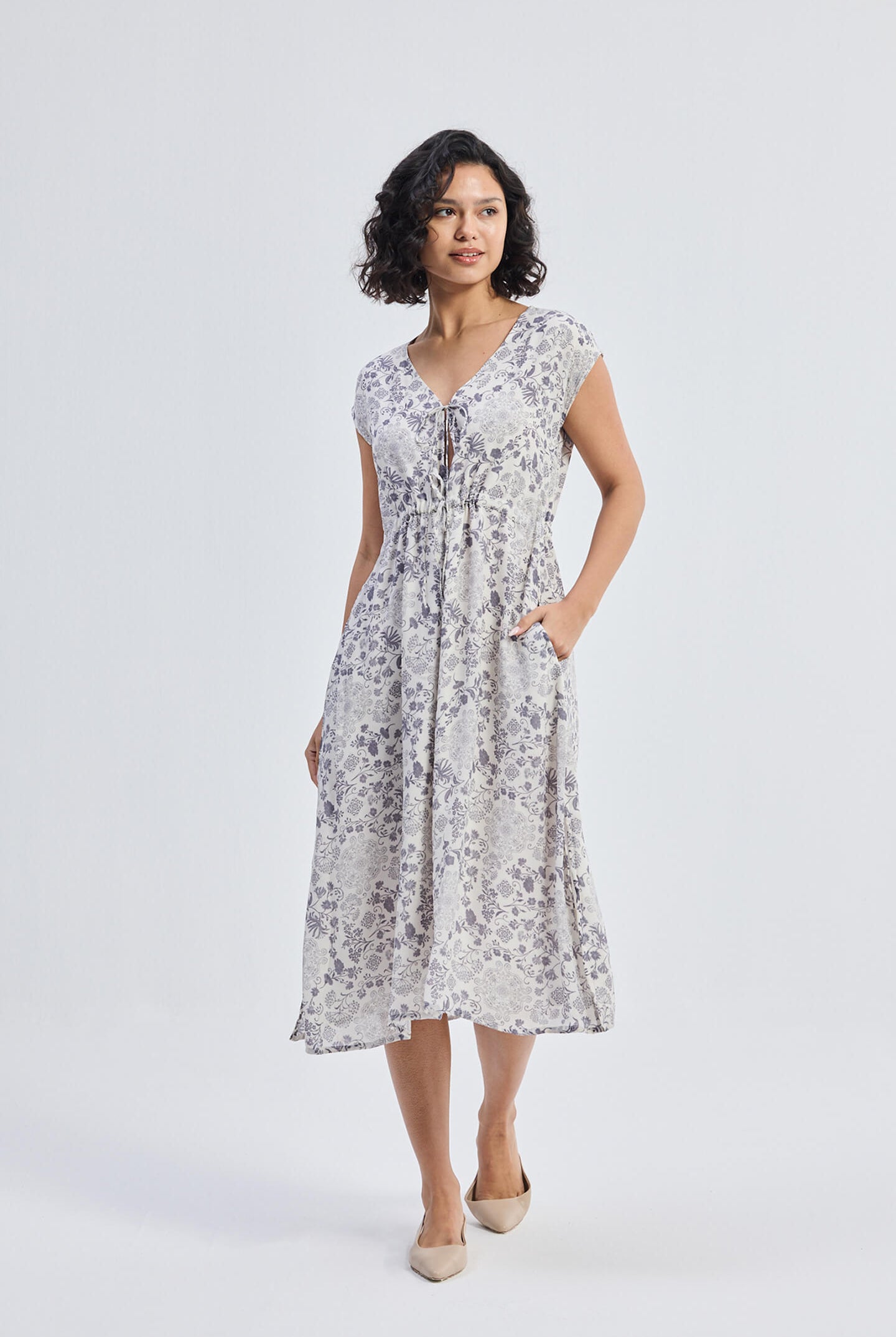 Deep V-neck Gathered Dress in Florals Moodshot