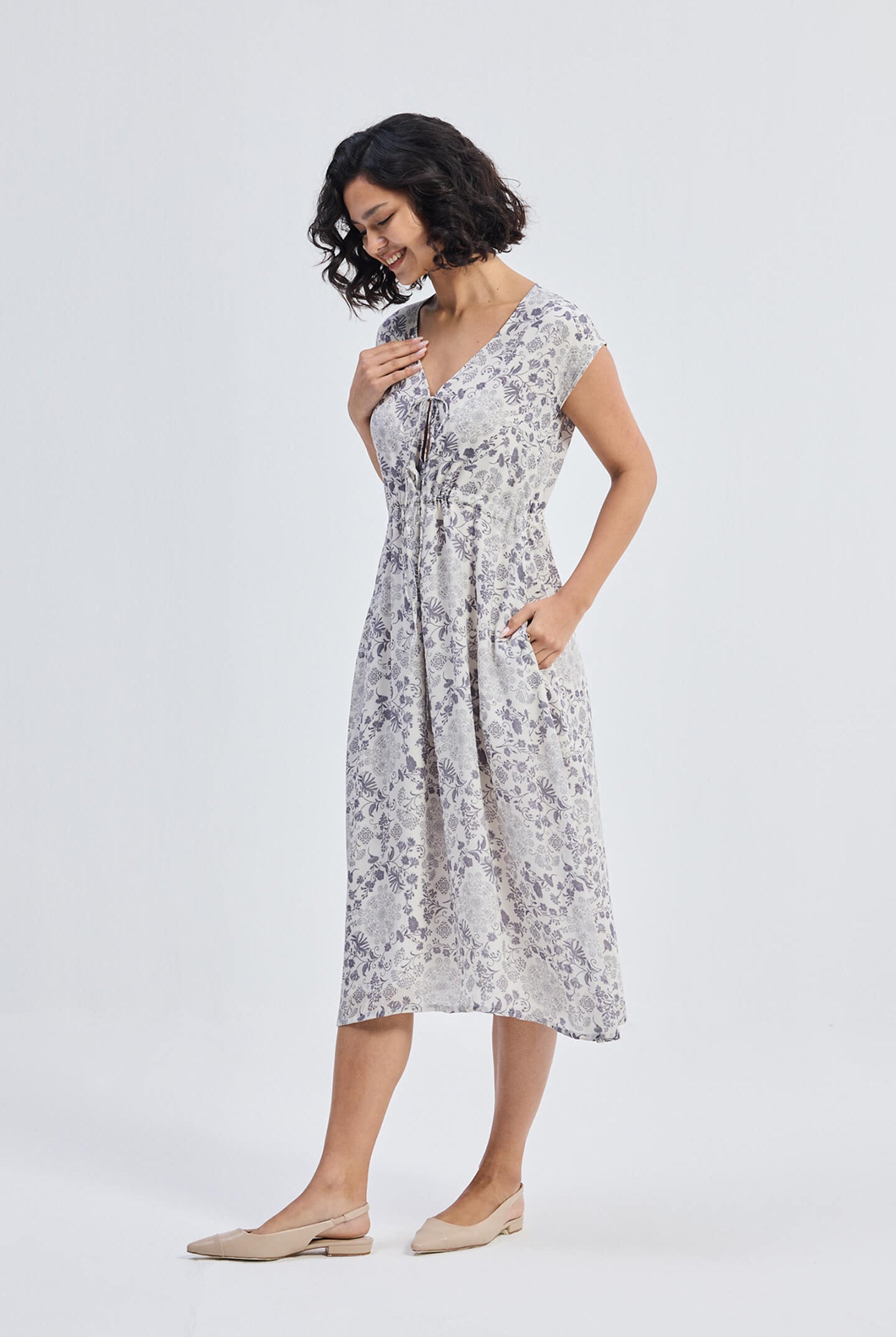 Deep V-neck Gathered Dress in Florals Moodshot