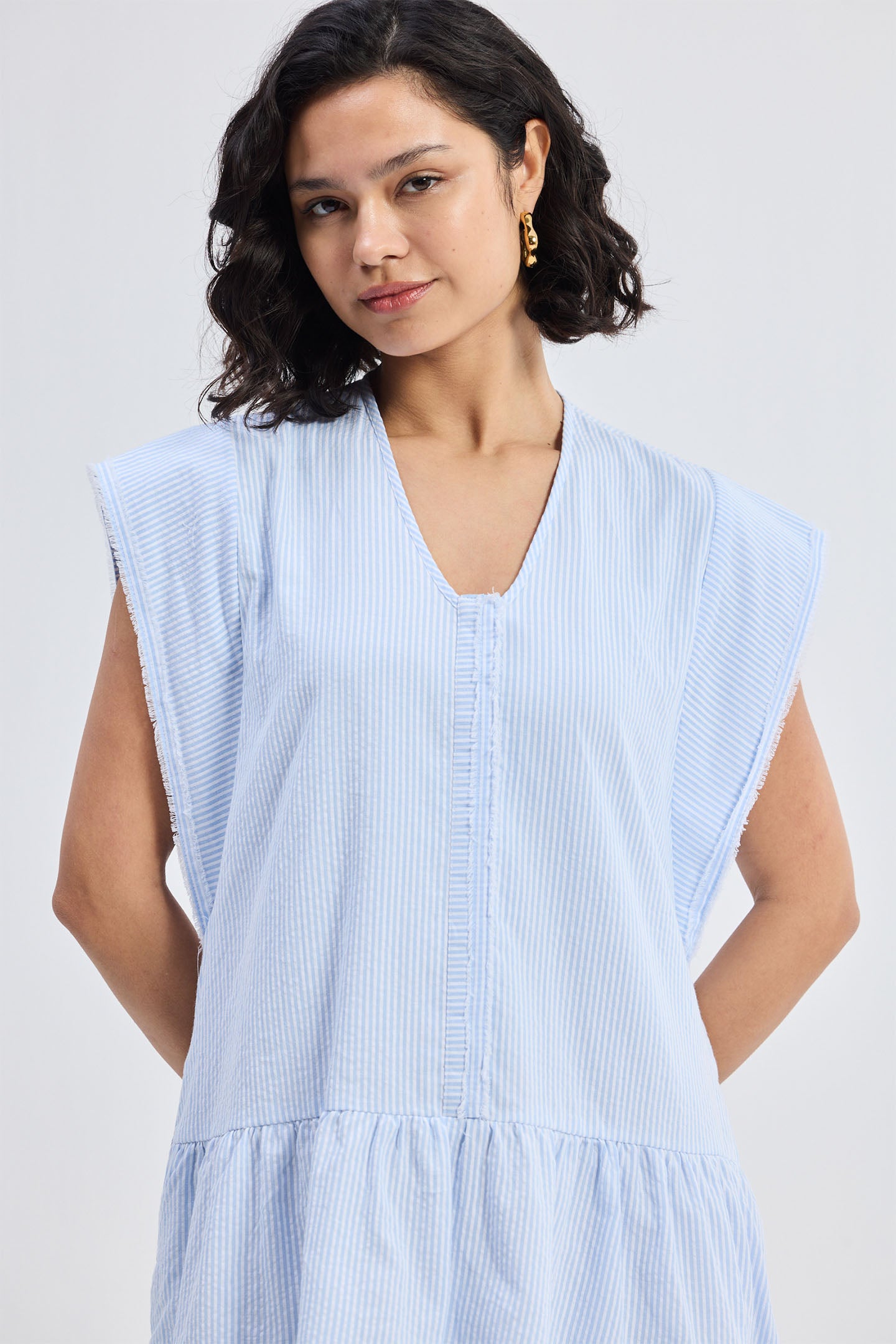 Oversized V neck Short Dress with Frayed Sleeves Closeup
