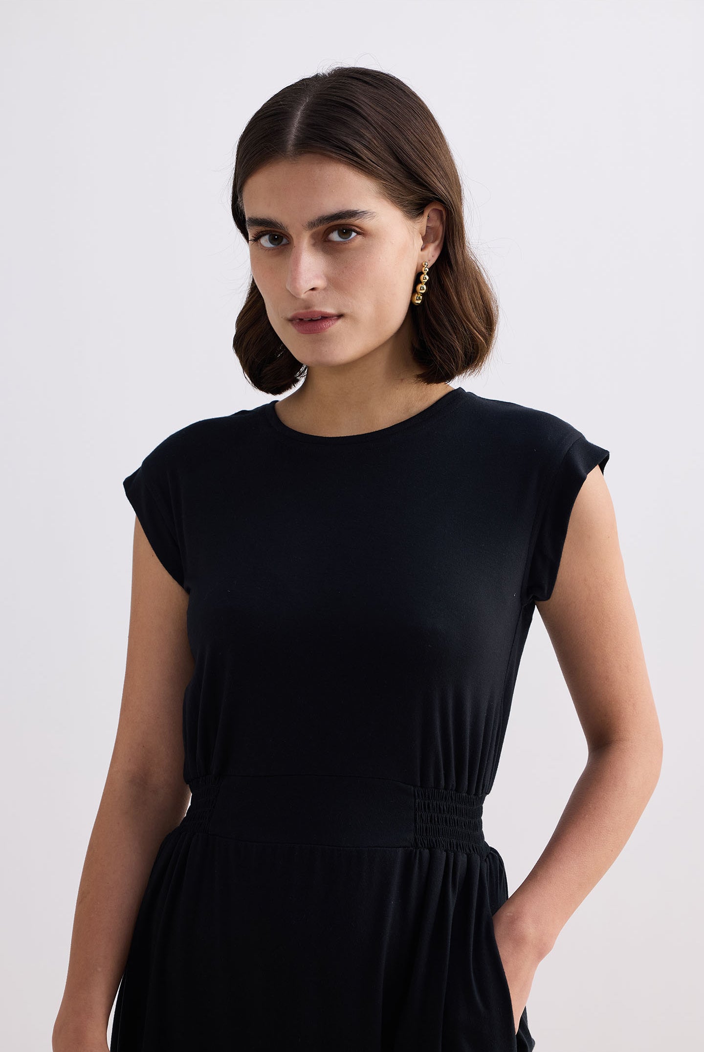 Short Dress With Smocking Side Detail in Black Closeup