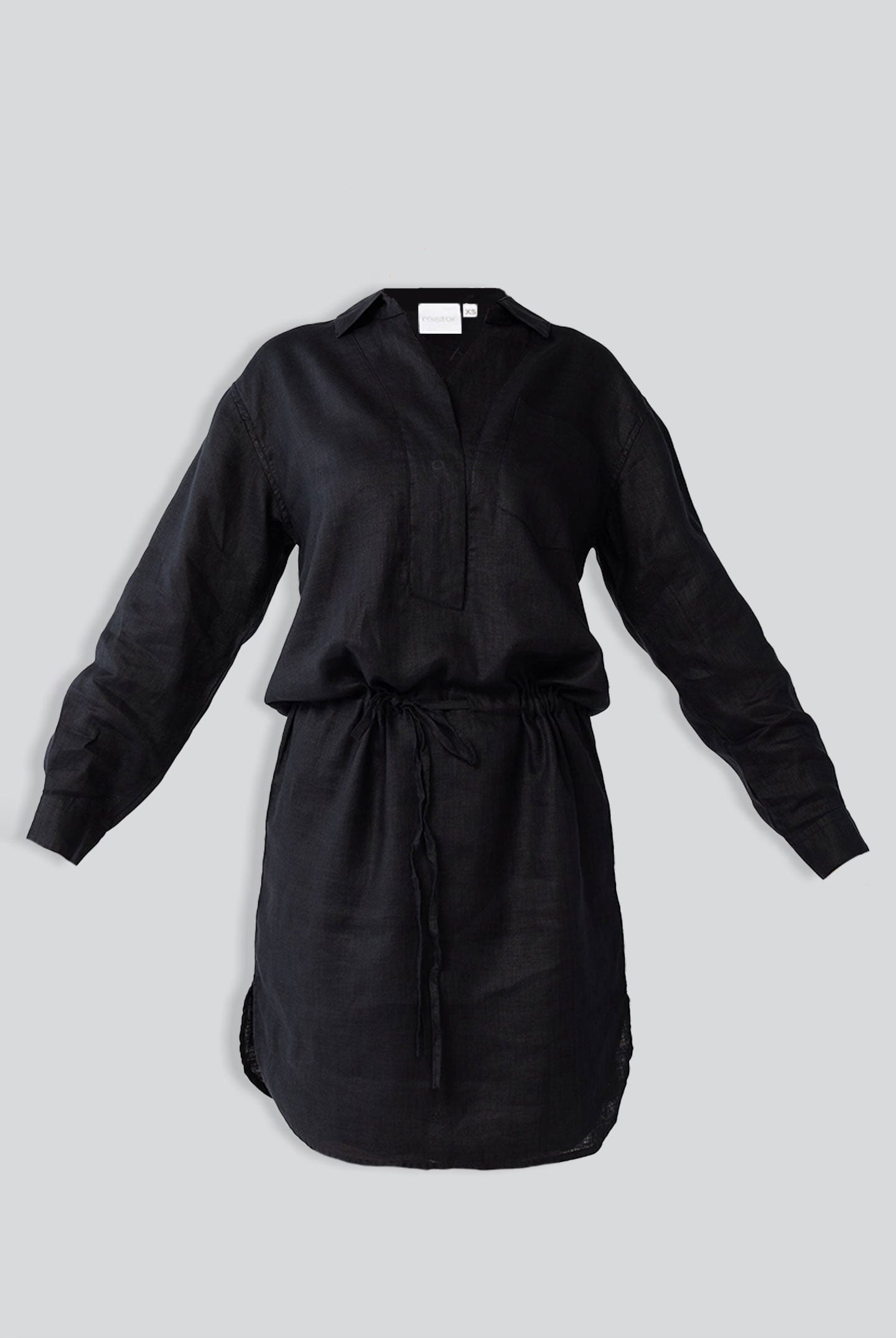 Black dress with a belt on a light gray background