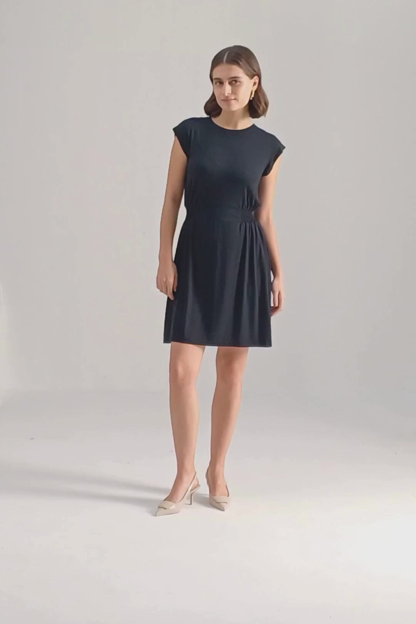 Short Dress With Smocking Side Detail in Black Moodshot Video
