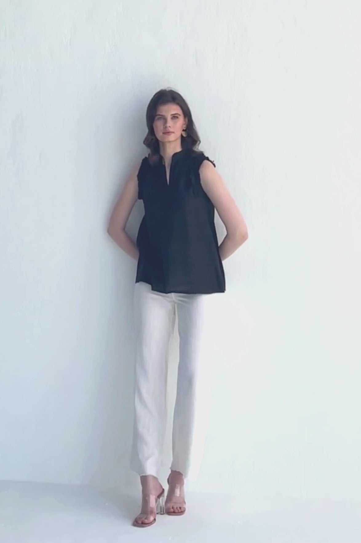 Sleeveless Hemp Top with Ruffles in Black Moodshot Video