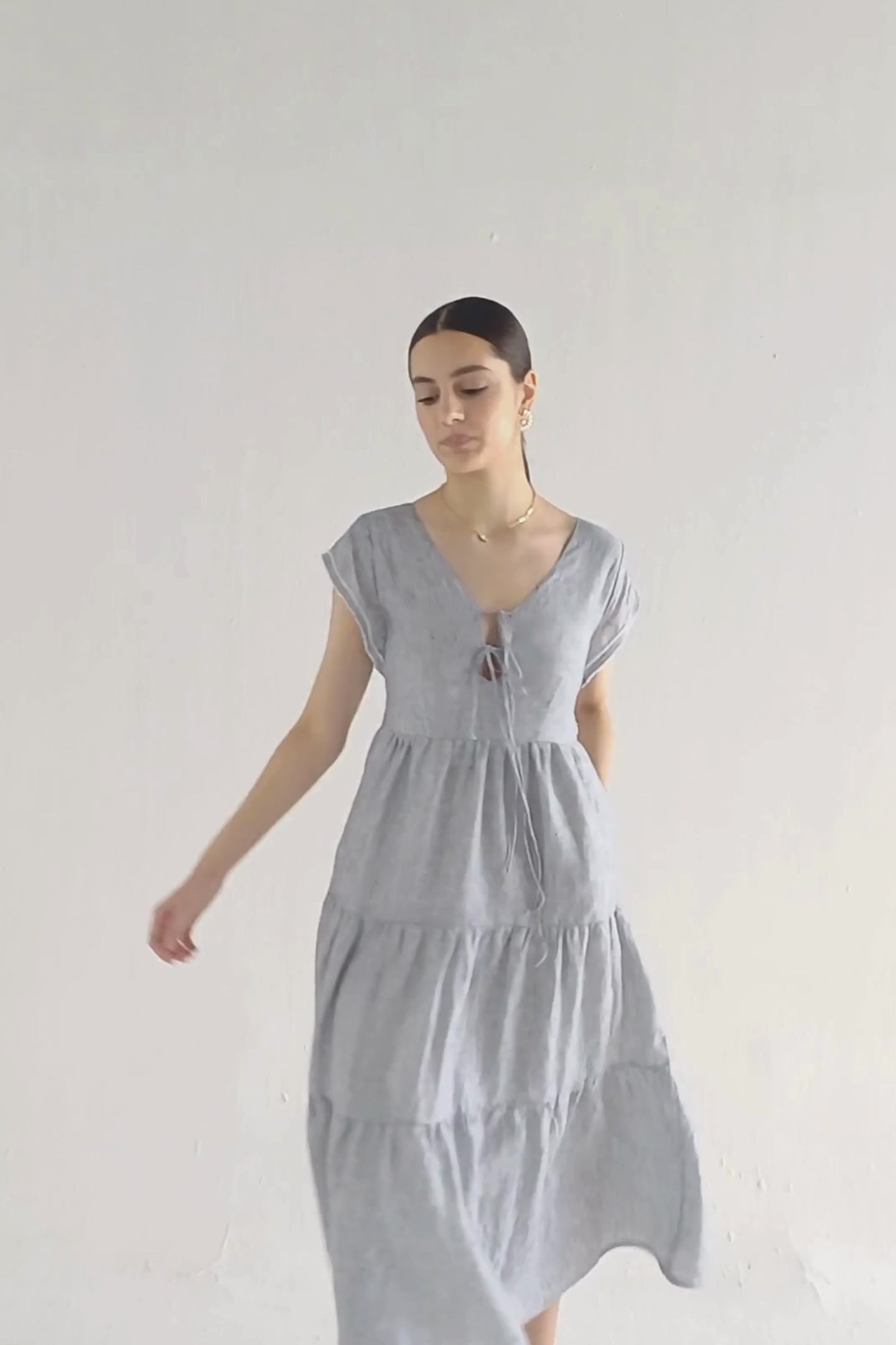 Maxi Tired Dress with Front-ties in Linen Stripes Moodshot Video