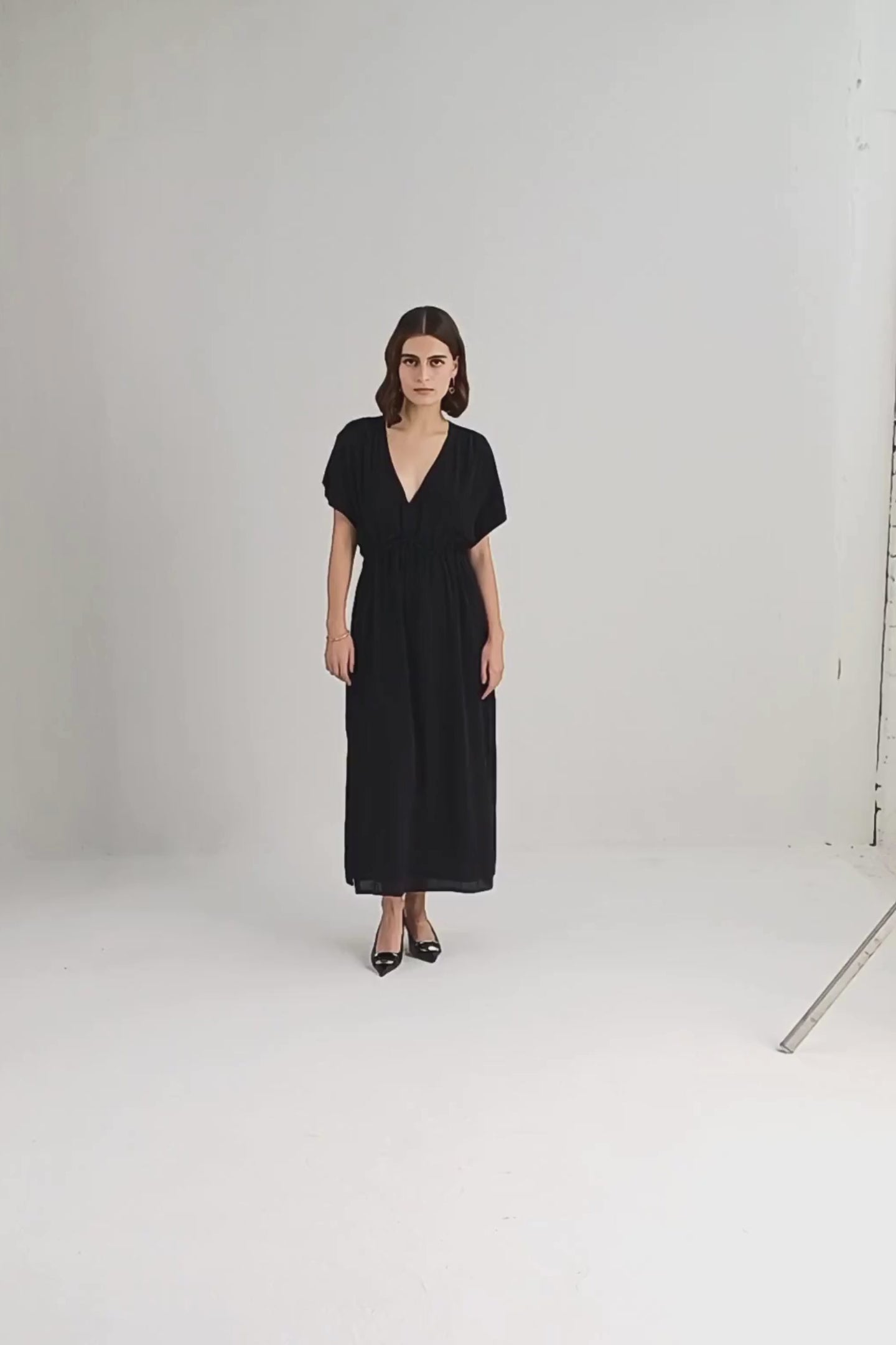 V-neck Gathered Maxi Dress in Black Moodshot Video