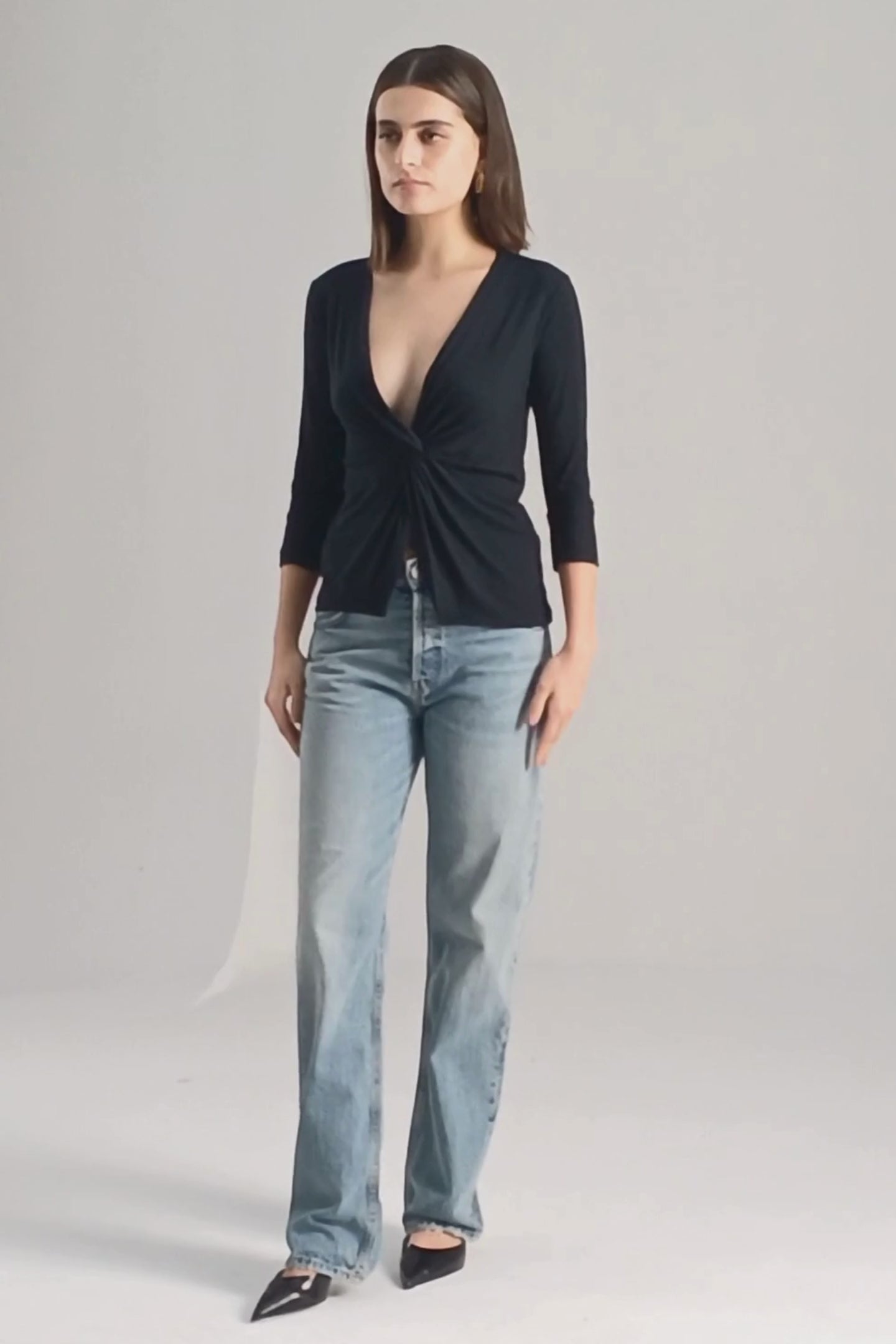 Twist Front Knit Shirt in Black Moodshot Video