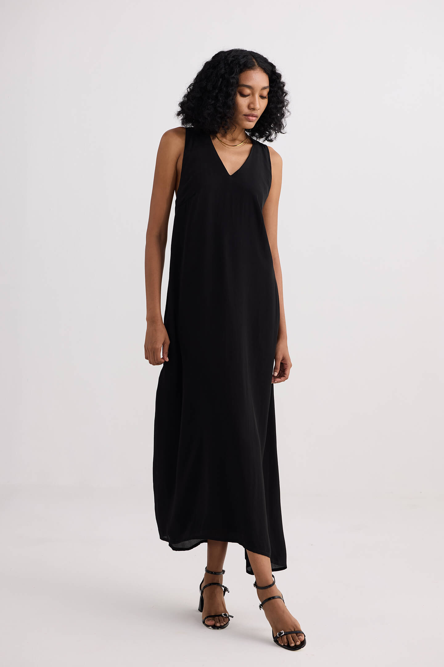 Crossed in Chic Sleeveless Maxi Dress in Black Moodshot