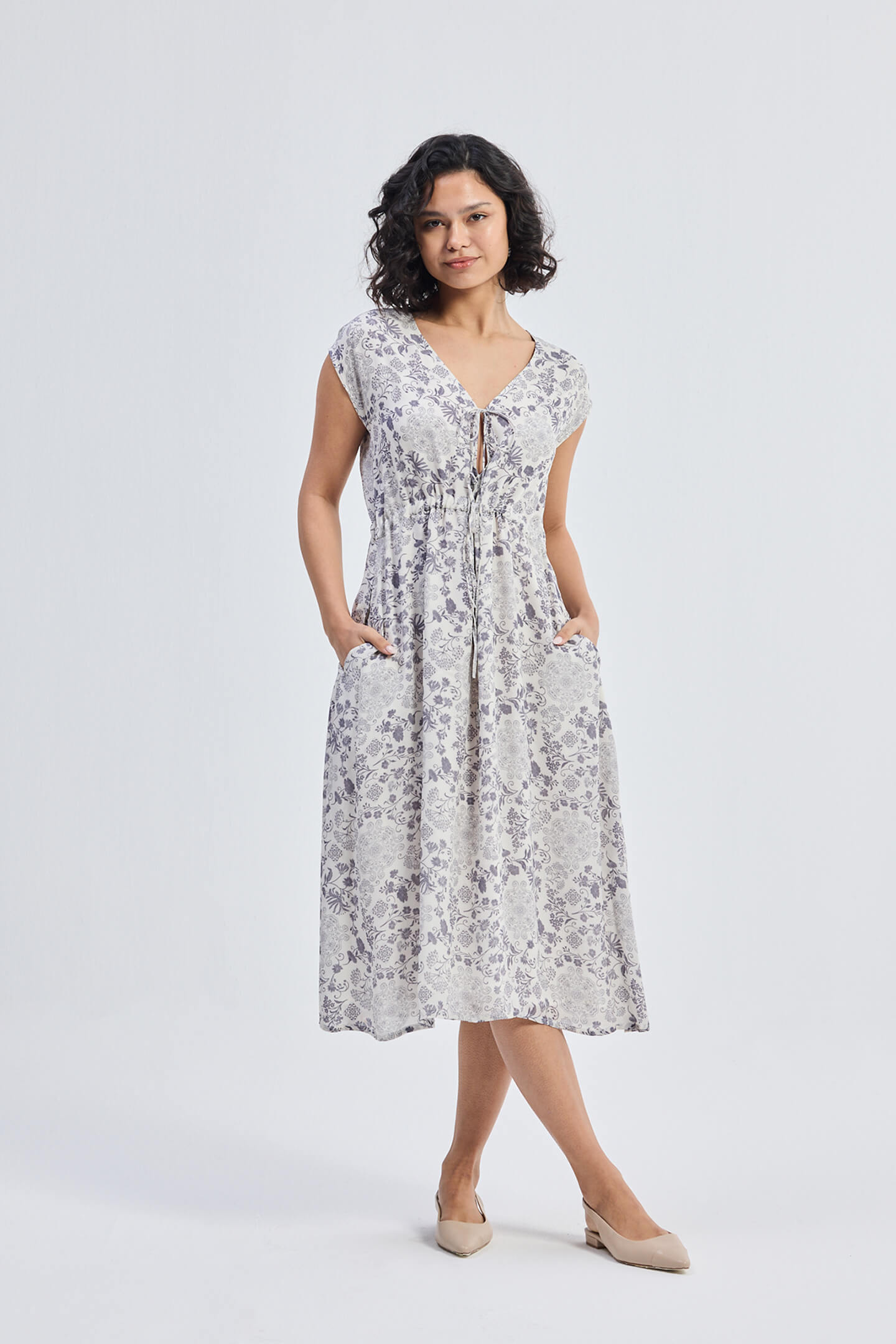 Deep V-neck Gathered Dress in Florals Front
