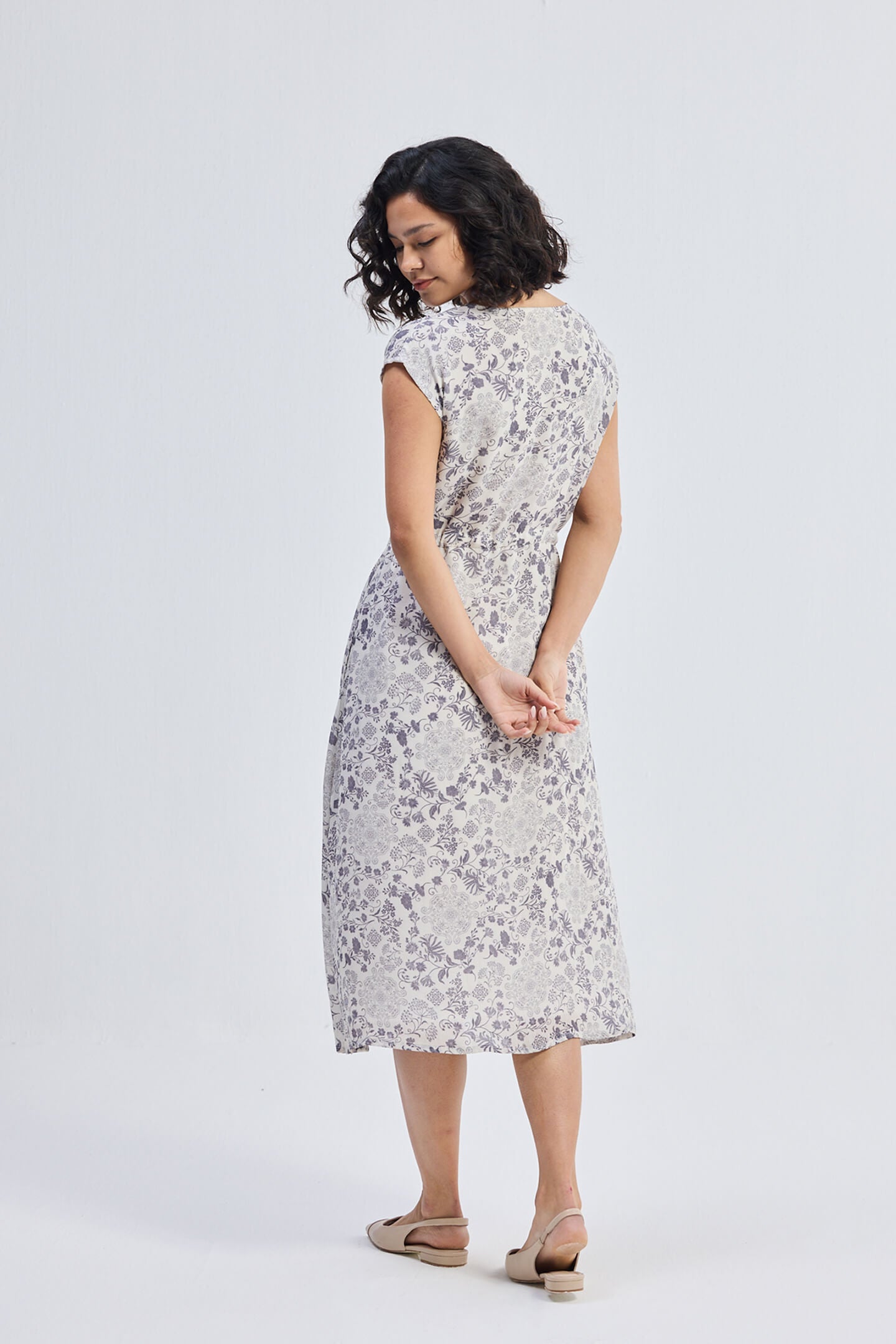 Deep V-neck Gathered Dress in Florals Back