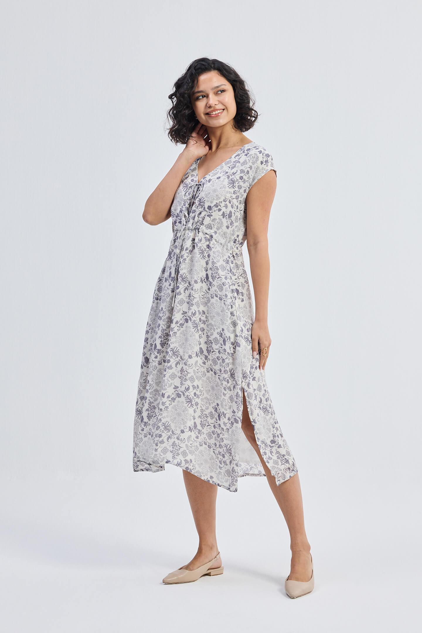 Deep V-neck Gathered Dress in Florals Moodshot