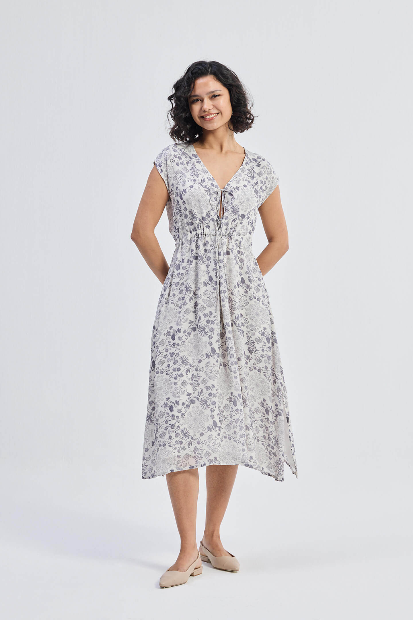 Deep V-neck Gathered Dress in Florals Front