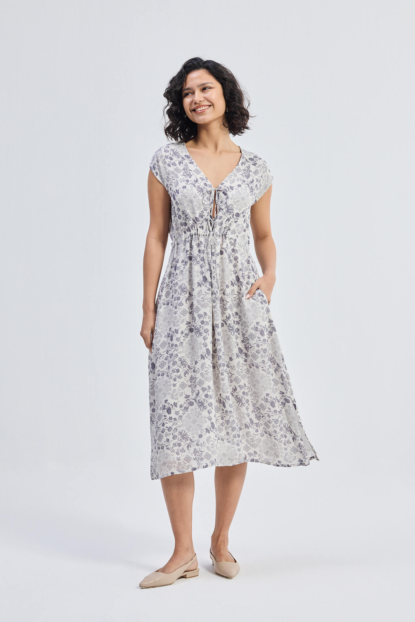 Deep V-neck Gathered Dress in Florals Front
