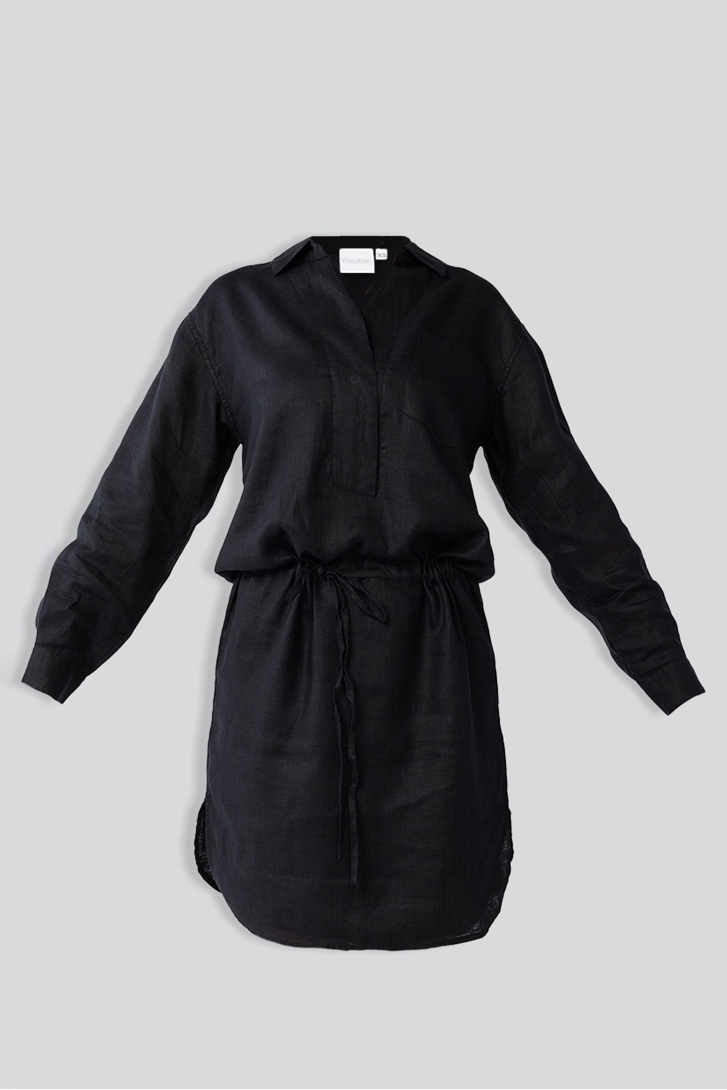 Black dress with a belt on a light gray background