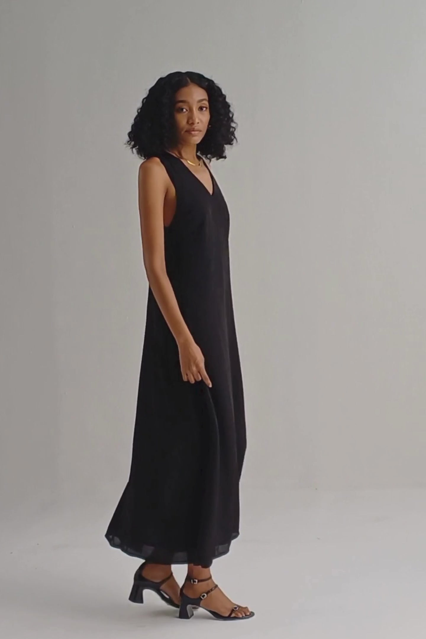 Crossed in Chic Sleeveless Maxi Dress in Black