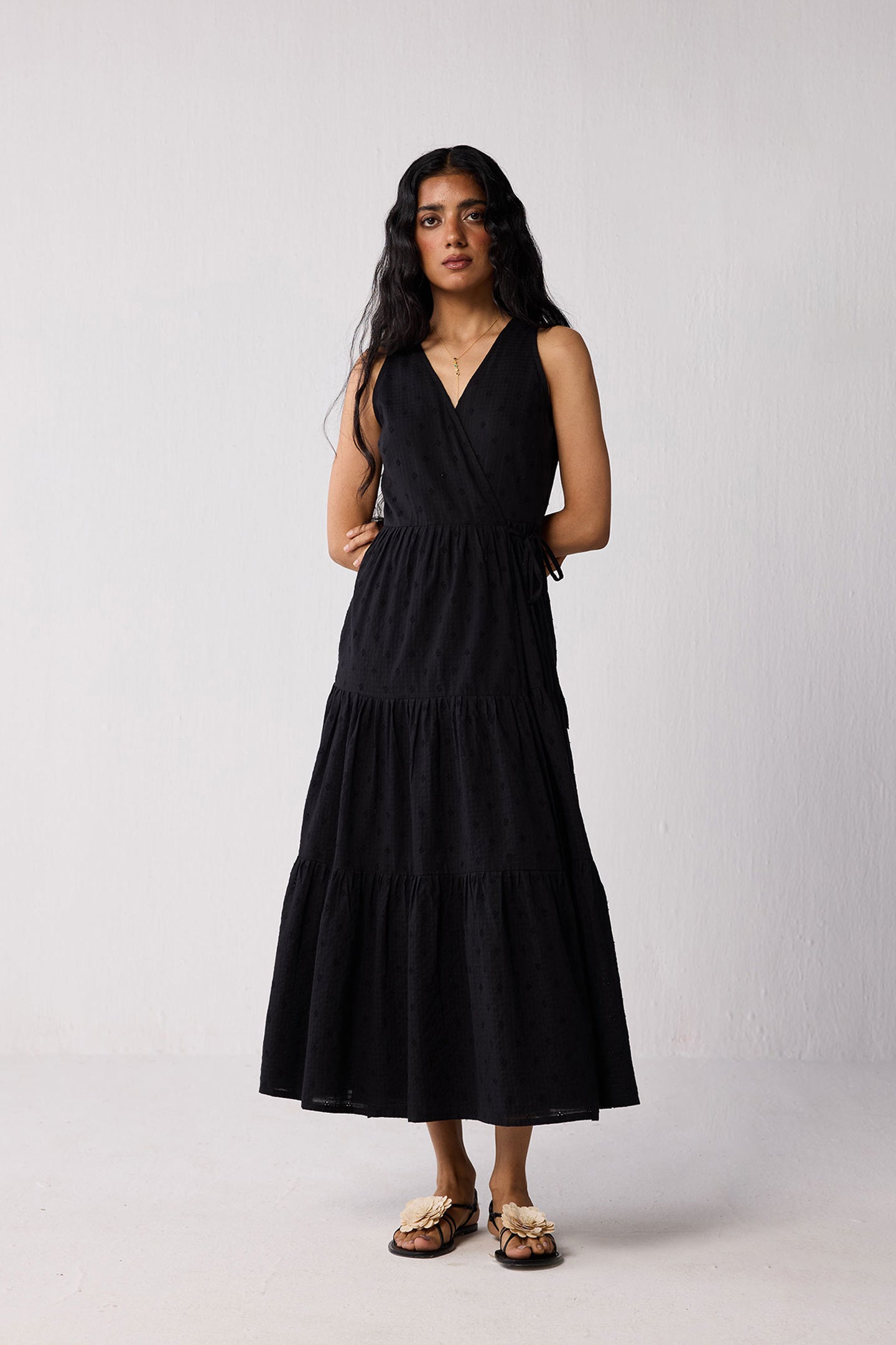 Sleeveless Embroidered Wrap Dress with Tiers in Black Textured Eyelet in Black / S Sleeveless Embroidered Wrap Dress with Tiers in Black Textured Eyelet in Black / S