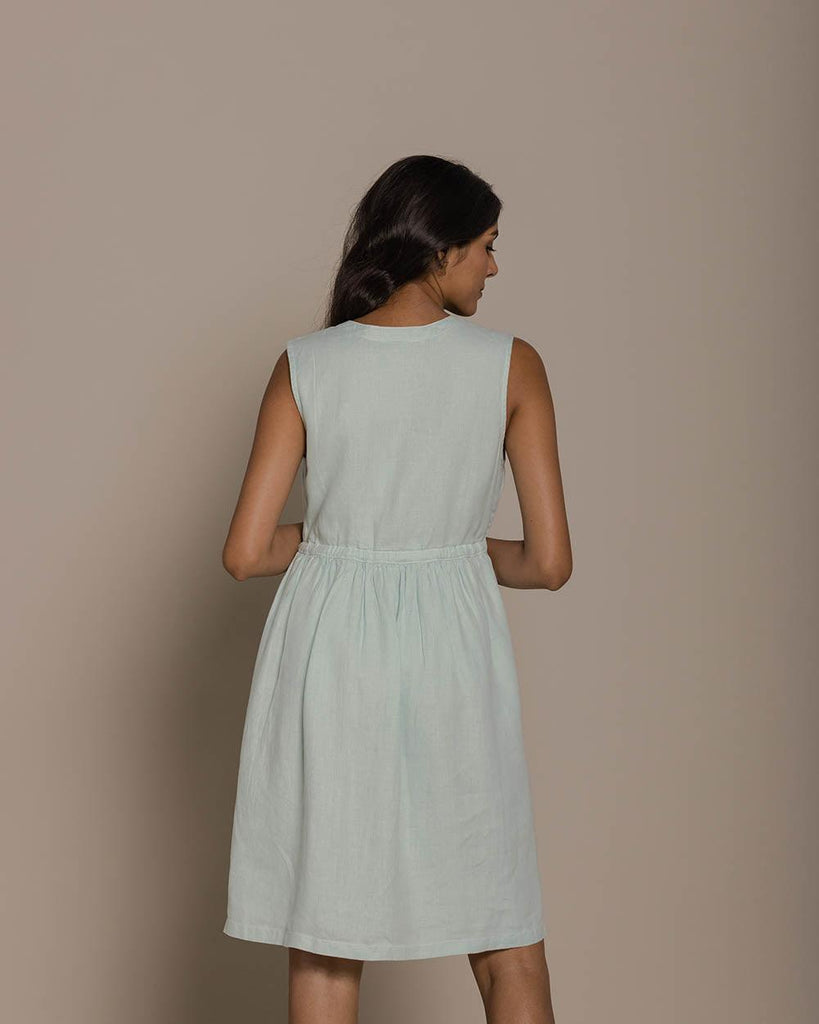 functional mint mid length sleeveless dress with a drawstring to define the waistline.