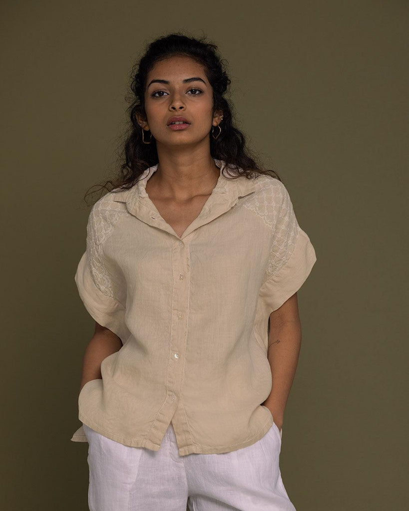 Beige mini sleeves top with embroidered shoulders